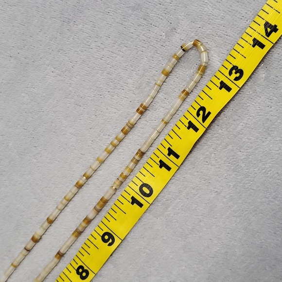 Polished Puka Shell Bead Necklace - Picture 6 of 7